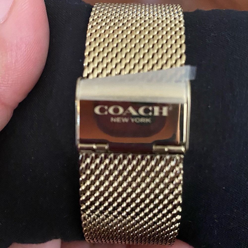 Brand new Coach watch - no scratches plastic covering tags included.